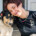 Young compassionate woman with a dog who has been abused.