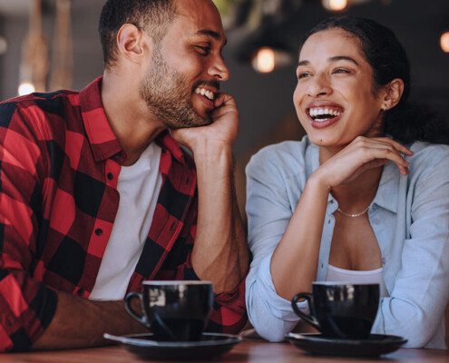 Beautiful couple at cafe