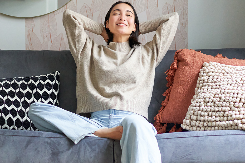 Woman relaxing on couch